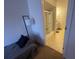 Bedroom featuring a bathroom and a bed at 8386 Sw 136Th Pl, Ocala, FL 34473