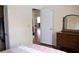 Bedroom features hardwood floors, closet, and furnishings at 8569 Sw 92Nd Ln # B, Ocala, FL 34481