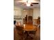 Dining room features a round wooden table and chairs at 8569 Sw 92Nd Ln # B, Ocala, FL 34481