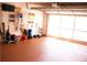 A clean garage with an epoxy floor, and labeled 'Gathering Room' at 8569 Sw 92Nd Ln # B, Ocala, FL 34481