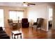 Inviting living room featuring hardwood floors and a large window at 8569 Sw 92Nd Ln # B, Ocala, FL 34481