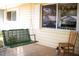 Relaxing porch with a comfortable swing, overlooking the yard at 8569 Sw 92Nd Ln # B, Ocala, FL 34481