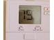 Close-up of a thermostat displaying a temperature of 79 degrees Fahrenheit at 8569 Sw 92Nd Ln # B, Ocala, FL 34481