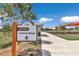 Well-maintained archery range with clear signage, lush landscaping, and a convenient walkway at 8836 Sw 90Th Ln # B, Ocala, FL 34481