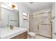 Updated bathroom featuring vanity with quartz countertop and glass shower at 8836 Sw 90Th Ln # B, Ocala, FL 34481