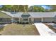 Charming single-story home featuring well-kept landscaping, a gray roof and a welcoming entrance at 8836 Sw 90Th Ln # B, Ocala, FL 34481