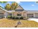 Quaint home with a well-manicured lawn, covered porch, and inviting curb appeal at 8836 Sw 90Th Ln # B, Ocala, FL 34481