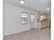 Bright kitchen offers neutral cabinets, tile floors and abundant natural light at 8836 Sw 90Th Ln # B, Ocala, FL 34481