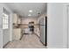 Spacious kitchen featuring stainless steel appliances and tile flooring at 8836 Sw 90Th Ln # B, Ocala, FL 34481