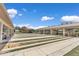 A large recreational area offering shuffleboard courts, horseshoe pits, and a playground with sunshades at 8836 Sw 90Th Ln # B, Ocala, FL 34481
