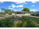 Exterior of the back of the house, with backyard and plants at 9300 Se 161St St, Summerfield, FL 34491