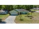 Charming one-story home with a two car garage, landscaped yard at 9300 Se 161St St, Summerfield, FL 34491