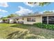 Lush backyard with a screened lanai, perfect for relaxation and outdoor enjoyment at 9820 Sw 89Th Ter # B, Ocala, FL 34481
