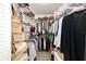 Organized walk-in closet with ample shelving and hanging space for easy storage at 9820 Sw 89Th Ter # B, Ocala, FL 34481