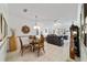 Charming dining area adjacent to the living room with unique decor at 9820 Sw 89Th Ter # B, Ocala, FL 34481
