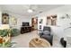 Open concept living room offering a view of the kitchen and access to an exterior door at 9820 Sw 89Th Ter # B, Ocala, FL 34481