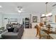 Spacious open living space featuring living, dining, and kitchen areas, great for Gathering gatherings at 9820 Sw 89Th Ter # B, Ocala, FL 34481