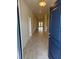 Inviting entryway with beautiful tile floors and a view of the spacious home at 2166 Nw 23Rd Loop, Ocala, FL 34475