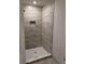 Modern bathroom showcasing tiled walk-in shower with stylish fixtures, offering a clean and functional space at 2218 Nw 23Rd Loop, Ocala, FL 34475