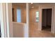Hallway showing seamless transitions between rooms with natural light, enhancing the sense of openness at 2218 Nw 23Rd Loop, Ocala, FL 34475