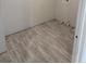 Laundry room with tiled floors and utility hookups, offering a functional space for laundry needs at 2218 Nw 23Rd Loop, Ocala, FL 34475