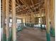 Bright interior framing with insulation, concrete floors, open space and visible studs at 4522 Sw 90Th Lane Rd, Ocala, FL 34476