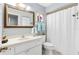 Clean bathroom featuring neutral colors, a framed mirror, vanity, and a shower-tub combination at 10190 Se 178Th St, Summerfield, FL 34491