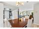 Inviting dining area with an open layout, connecting the kitchen and living spaces at 10190 Se 178Th St, Summerfield, FL 34491