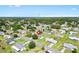 Drone shot of the area highlights the lush surroundings and accessible location of the property at 10385 Se 178Th St, Summerfield, FL 34491