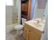 Bathroom features a shower/tub combination, vanity, and natural light at 10955 Sw 89Th Ave, Ocala, FL 34481