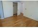 Empty bedroom with hardwood floors and closet at 10955 Sw 89Th Ave, Ocala, FL 34481