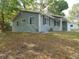 Well-maintained single-story home with blue siding and updated windows at 10955 Sw 89Th Ave, Ocala, FL 34481