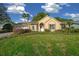 Charming single-Gathering home featuring a well-maintained lawn and lush landscaping at 11645 Sw 75Th Cir, Ocala, FL 34476