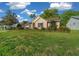 Attractive home featuring a spacious front yard and mature landscaping in a quiet neighborhood at 11645 Sw 75Th Cir, Ocala, FL 34476