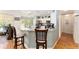 Bright kitchen boasts granite counters, stainless appliances, and open layout, perfect for cooking and entertaining at 11828 Se 91St Cir, Summerfield, FL 34491