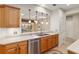 Eat-in kitchen with a breakfast bar and stainless steel appliances at 13109 Se 86Th Ct, Summerfield, FL 34491