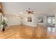 Bright living room with hardwood floors and an open layout at 13109 Se 86Th Ct, Summerfield, FL 34491