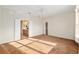Spacious main bedroom with connecting bathroom, offering comfort and convenience with natural light and ample closet space at 13109 Se 86Th Ct, Summerfield, FL 34491
