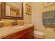 Bathroom with granite counters and vanity at 13300 Ne 38Th Ave, Anthony, FL 32617