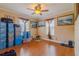 Bedroom with wood floors and windows at 13300 Ne 38Th Ave, Anthony, FL 32617