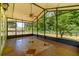 Screened lanai with tile flooring and views at 13300 Ne 38Th Ave, Anthony, FL 32617