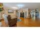 Spacious living room with wood floors and neutral color palette at 13300 Ne 38Th Ave, Anthony, FL 32617
