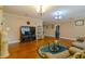 Open living room floor plan showcasing tile floors and decor at 13300 Ne 38Th Ave, Anthony, FL 32617