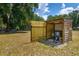 Outdoor well house offering protection from the elements in a lush green yard at 13300 Ne 38Th Ave, Anthony, FL 32617
