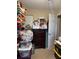 Bedroom used for storage, featuring a window, a dresser, and personal items throughout the room at 137 Juniper Loop, Ocala, FL 34480