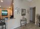 Home entryway showcasing wall art and decor in a modern-styled home at 137 Juniper Loop, Ocala, FL 34480