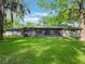 The backyard offers great views of the trees at 1505 Se 27Th Ter, Ocala, FL 34471