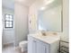 Clean bathroom with a white vanity and a shower at 1505 Se 27Th Ter, Ocala, FL 34471