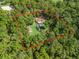 An aerial view of the property showing the home, acreage and outbuildings at 16 Northern Dancer Dr, Ocala, FL 34482