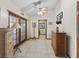 Inviting foyer with tile flooring, wood accents, and ample natural light at 16 Northern Dancer Dr, Ocala, FL 34482
